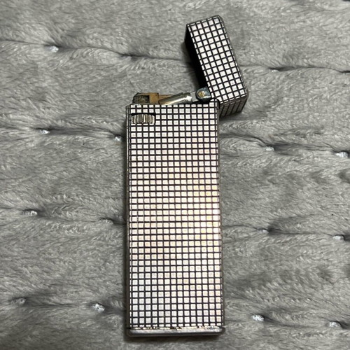 Silver lighter used with gas