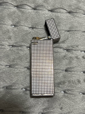 Silver lighter used with gas