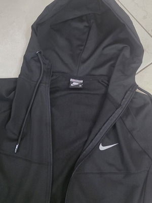 Nike women's black sports jacket, sizes M and L
