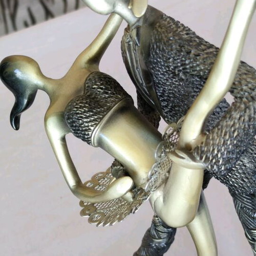 Decorative metal sculptures new, dancing couple and doll