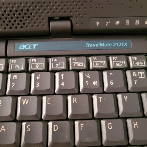 Acer laptop used, powers on without charger
