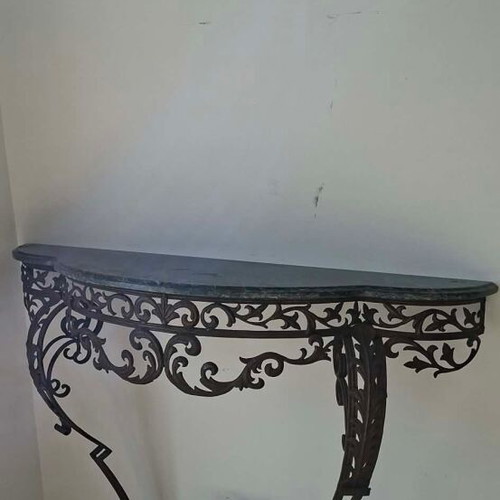 Metal console used with marble top and ornate wrought iron design