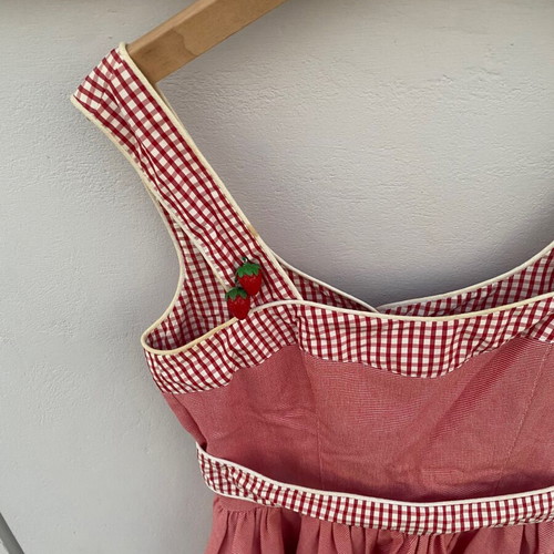 Dress small red used with checkered pattern and strawberries