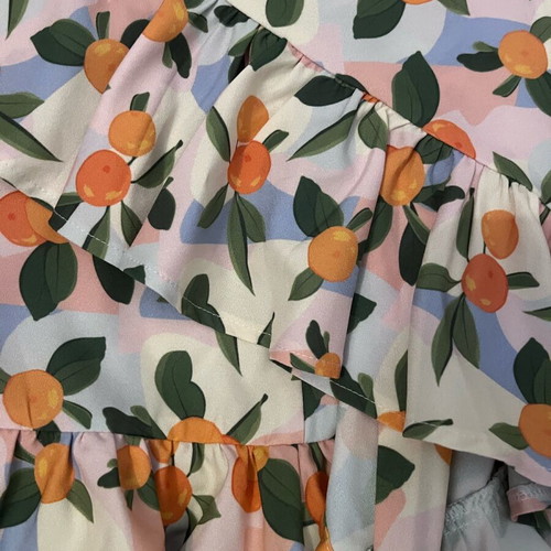 Wrap skirt like new with orange pattern, size M