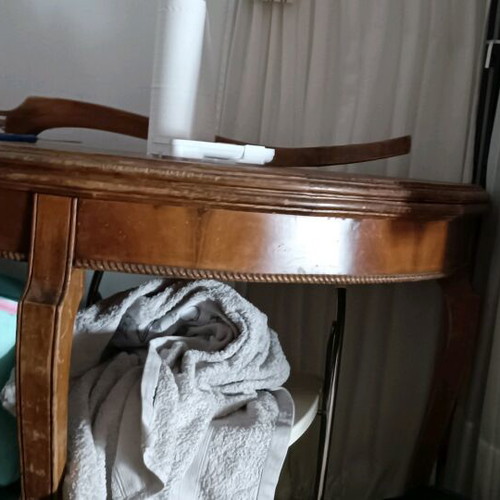 Antique folding table used that converts to round