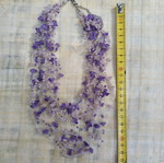 Handmade necklace with purple and white beads