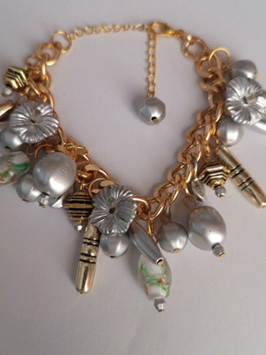Bracelet silver and gold with charms new