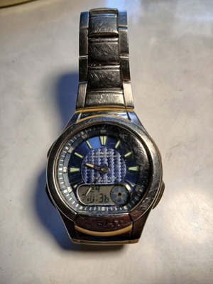 Casio Illuminator wristwatch used, blue and silver, solar battery