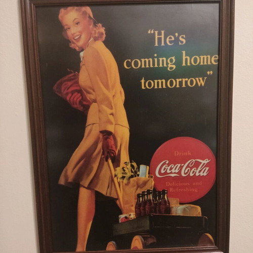 Coca Cola advertisement in wooden frame used