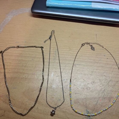 Necklace set of three gold-colored like new with adjustable clasp