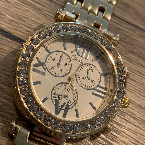 Golden wristwatch, women's