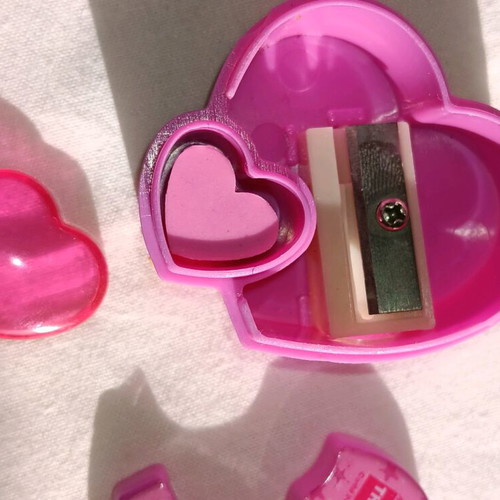 Pink heart-shaped sharpener with Yorkshire Terrier theme, like new