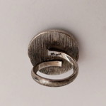 Silver ring used with enamel, orange-green