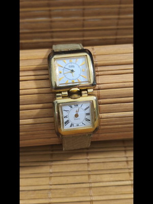 Women's dual time watch used with gold finish