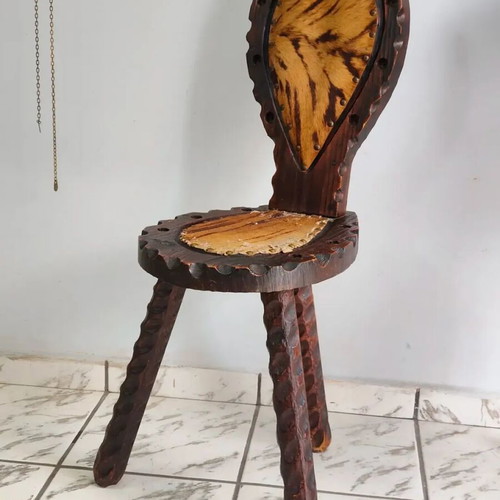 Spanish rustic chair used with three legs and animal leather