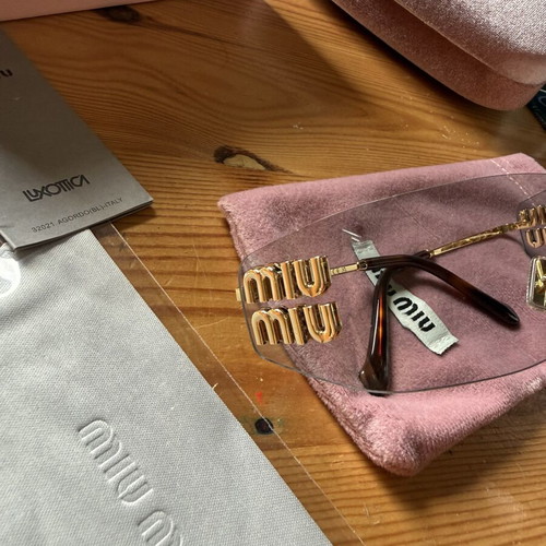 Miu Miu sunglasses, grey and gold