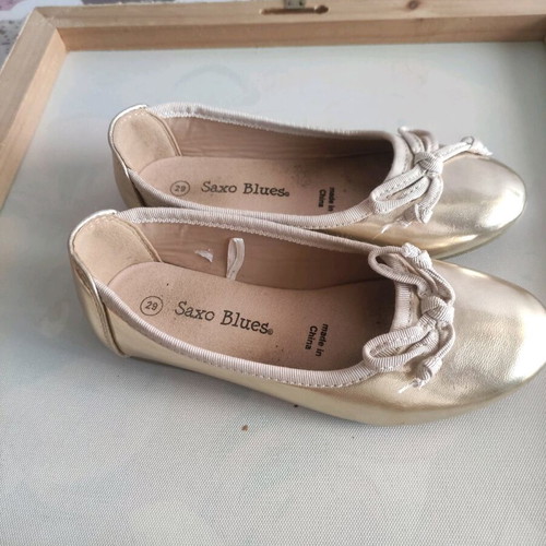 Gold-colored shoes like new, size 29, barely worn