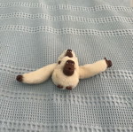 Stuffed monkey used, white