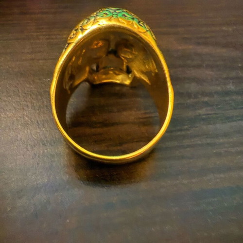 Skull ring steel gold black in excellent condition