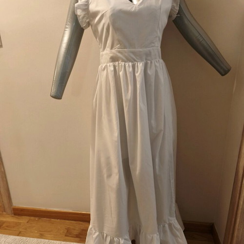 Women's white dress used with open back and nice fit