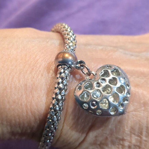 Elastic bracelet used with decorative silver heart charm