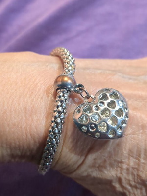 Elastic bracelet used with decorative silver heart charm
