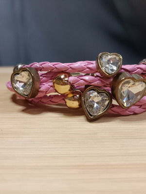 Pink gold women's bracelet with rhinestones