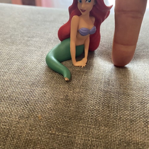 Ariel figure used, missing tail