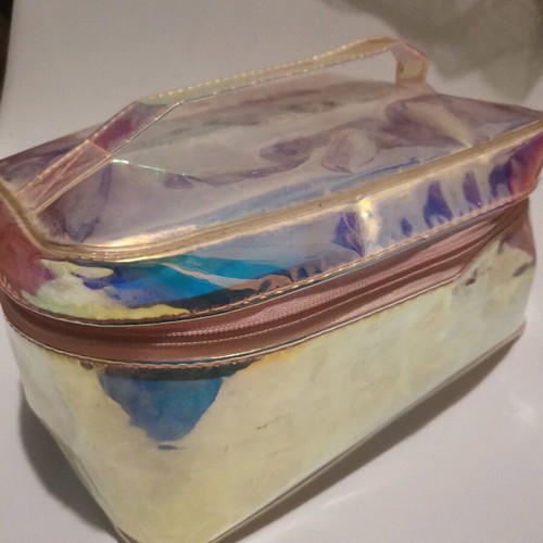 Holographic toiletry bag like new