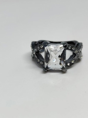 Black ring with large emerald cut crystal, like new