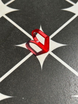 Plexiglass ring like new with red transparent color and unique design