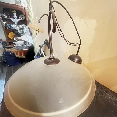 Rustic ceiling pendant light with bronze frame and glass shade