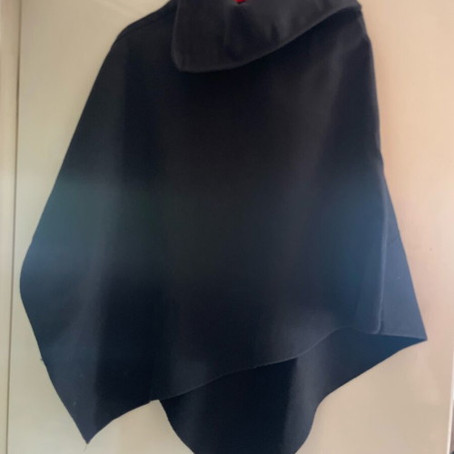 Black cape like new, worn very little