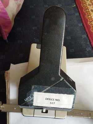 Vintage heavy-duty hole punch used, branded
