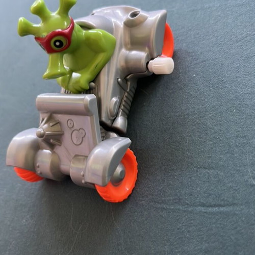 Toy car with alien like new