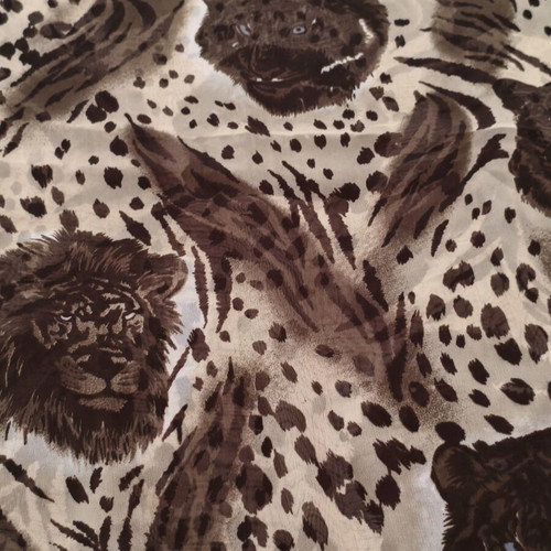 African pareo with wild feline print used, leopard and tiger patterns