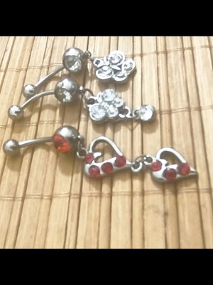 Navel piercings like new, set of three