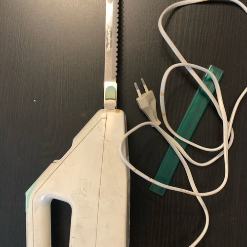 Moulinex electric knife used with worn yellow rubber