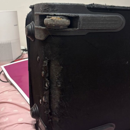 Benetton fabric black suitcase used with two wheels