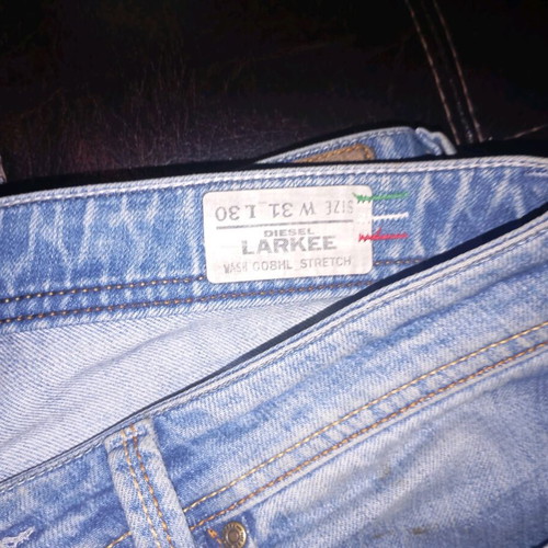 Vintage solid Italian Diesel Larkee unisex jeans used, M31 L30