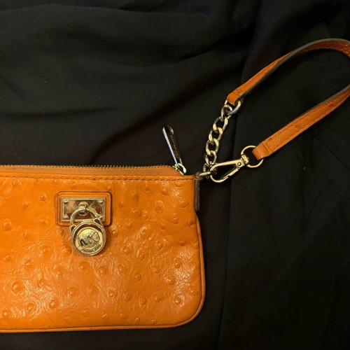 Michael Kors mini leather wallet used orange
