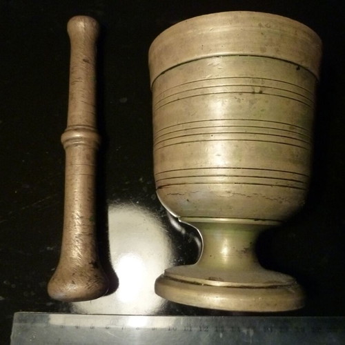 Antique bronze mortar with pestle used