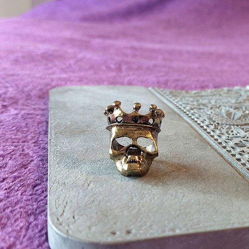 Bronze skull ring with crown, rock style