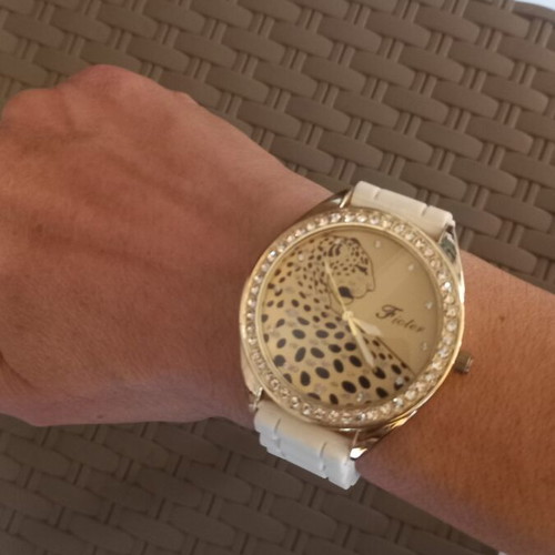 Women's wristwatch with rhinestones, white plastic strap