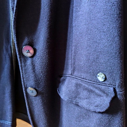 Blue jacket like sweatshirt used with two buttons