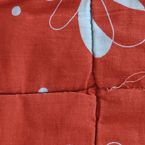 Double quilt used with seam defects