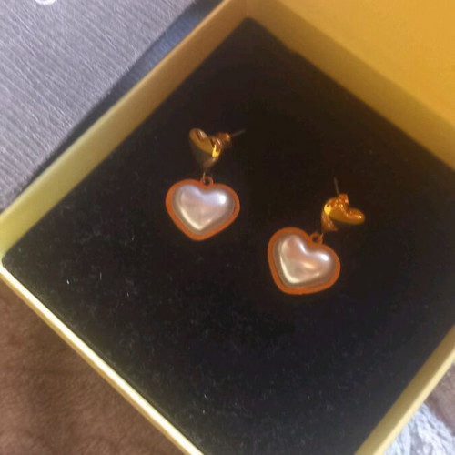 Women's earrings like new, gold-colored