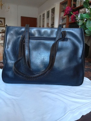 Women's black shoulder bag like new, possibly leather