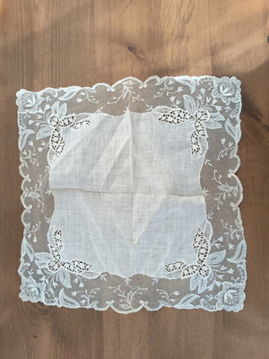 Vintage doily used with brown stains