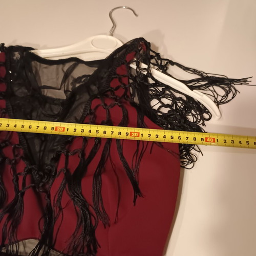 Midi dress for special occasions like new, burgundy with lace and fringes